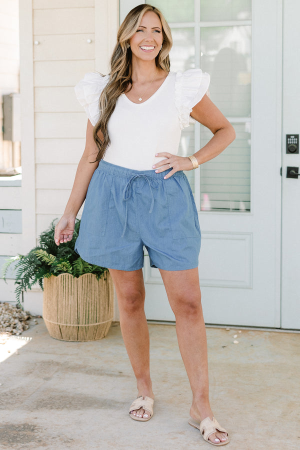 light denim drawstring shorts with drawstring waist and large front pockets