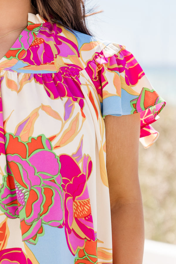 Chic Soul plus size clothing, short-flutter-sleeve top with a split-v-neckline and a multi-colored floral pattern