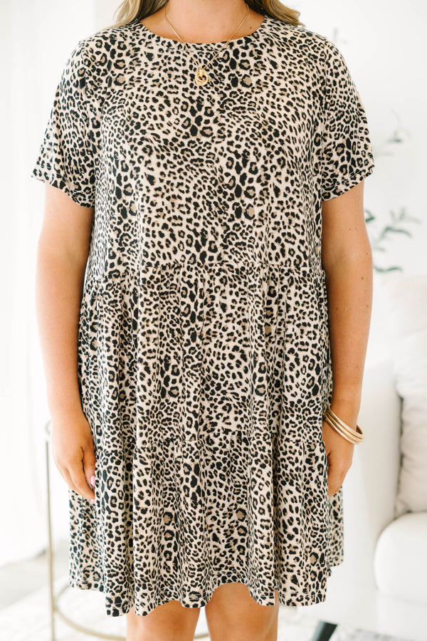 Plus Size leopard print tiered mini dress with short sleeves and a round neckline.