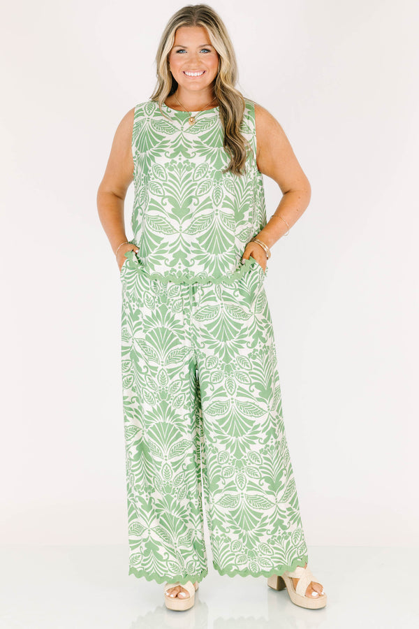 Plus Size sleeveless green tropical floral print top with a scalloped ric rac hem.