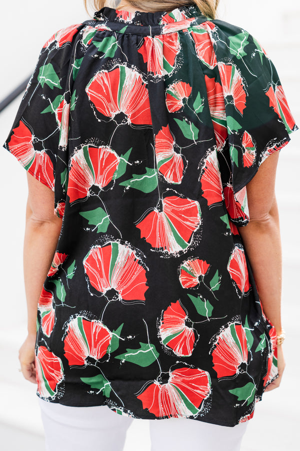 Chic Soul plus size clothing, short-sleeve black top with a split-v-neckline and a red and green abstract floral pattern 