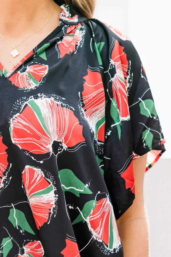 Chic Soul plus size clothing, short-sleeve black top with a split-v-neckline and a red and green abstract floral pattern 