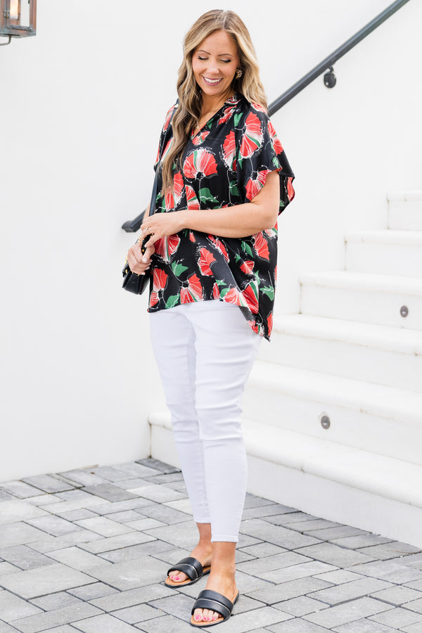 Chic Soul plus size clothing, short-sleeve black top with a split-v-neckline and a red and green abstract floral pattern 