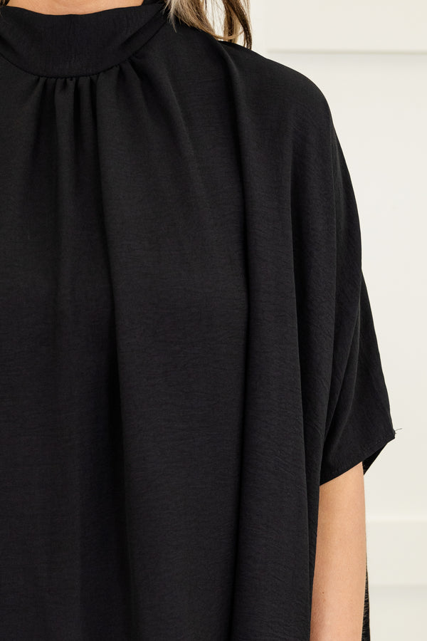 Chic Soul plus size clothing, short-sleeve black flowy high-low hemline top with a mockneck 