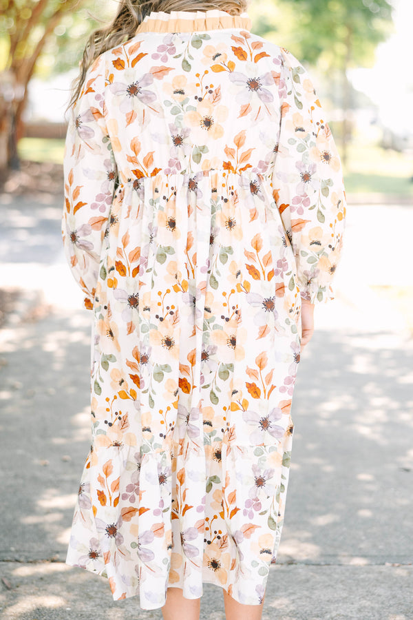 Plus Size cream floral midi dress with a ruffled V-neckline and tiered skirt in 100% cotton.