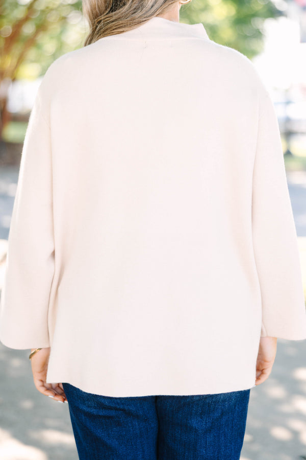 Plus Size taupe mock neck sweater with long wide sleeves and a relaxed fit.