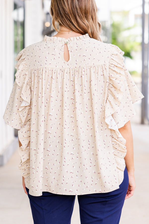 Chic Soul plus size clothing, beige short sleeve top with small floral detail with ruffle sleeves and ruffle along shoulders with mock neckline