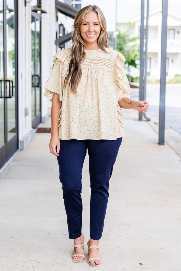 Chic Soul plus size clothing, beige short sleeve top with small floral detail with ruffle sleeves and ruffle along shoulders with mock neckline