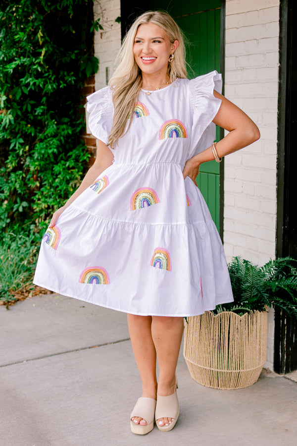 Chic Soul plus size clothing, short-flutter-sleeve white ruffled baby doll dress with a high-scoop-neckline and multi-colored sequined rainbow patches scattered across the dress with gold accents