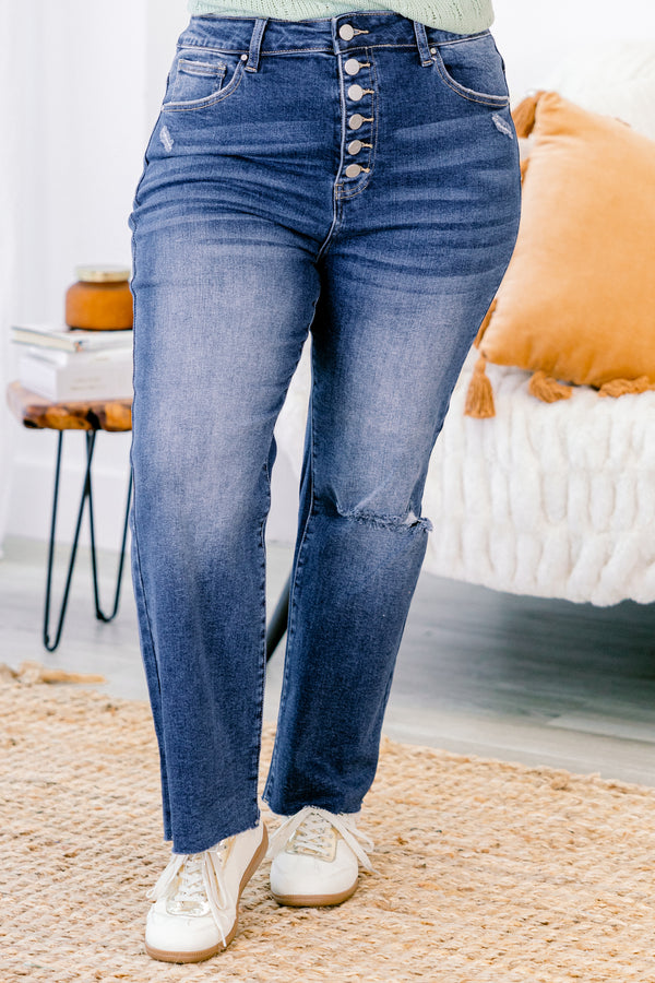 Chic Soul plus size clothing, Dark wash distressed jeans with a whole on the left knee and buttons instead of a zipper 