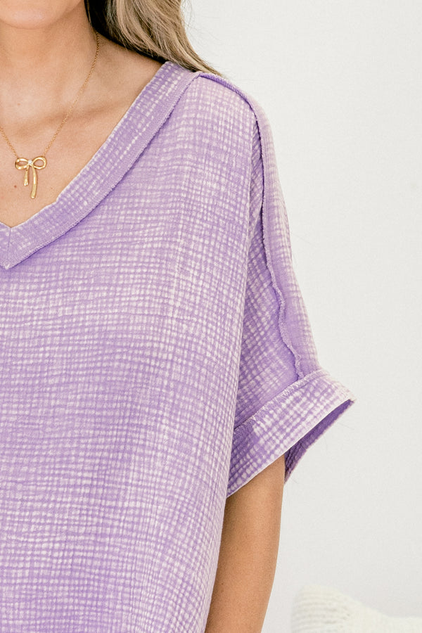 Chic Soul Plus size clothing, lavender acid wash short sleeve top with cuffs at the end of the sleeves and a v-neckline 
