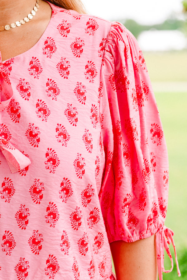 Chic Soul plus size clothing, pink drawstring-bubble-half-sleeve rounded neckline babydoll top with two tied bow closures near neckline and red dainty floral pattern