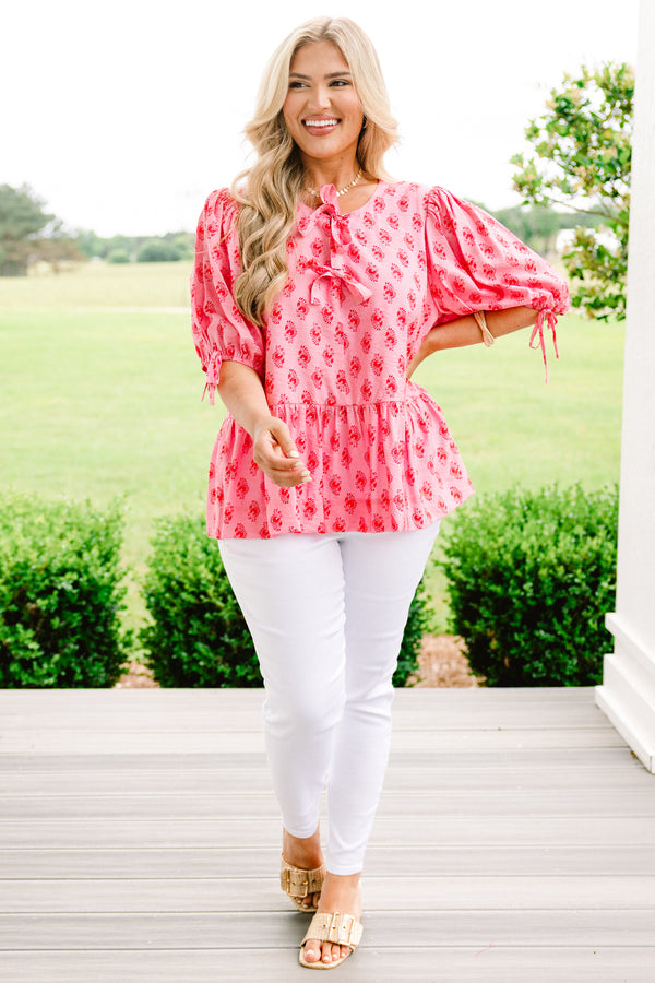 Chic Soul plus size clothing, pink drawstring-bubble-half-sleeve rounded neckline babydoll top with two tied bow closures near neckline and red dainty floral pattern
