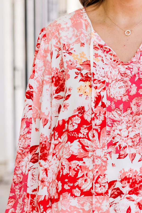 Chic Soul plus size clothing, long-sleeve v-neckline coral top with red and coral floral pattern and tassels on neckline