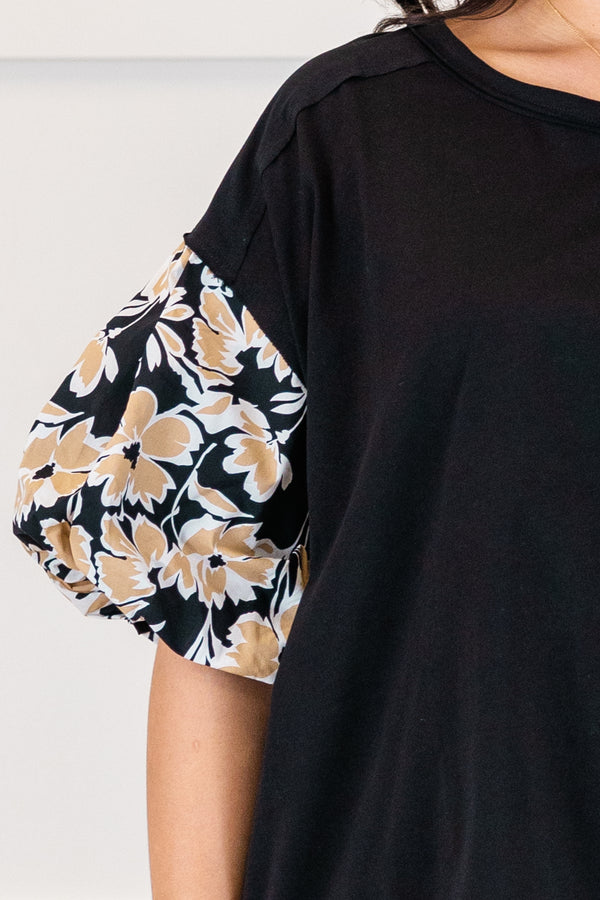Chic Soul plus size clothing, black top with gold floral pattern on the puff sleeves