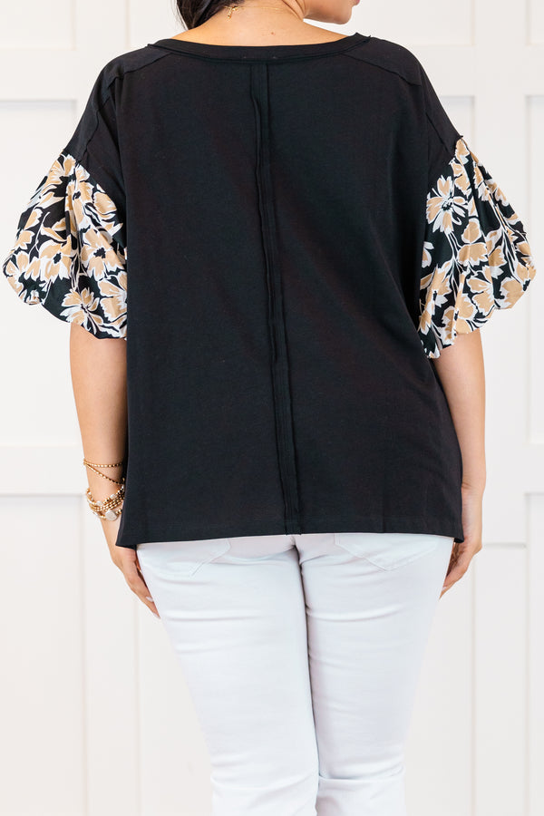 Chic Soul plus size clothing, black top with gold floral pattern on the puff sleeves