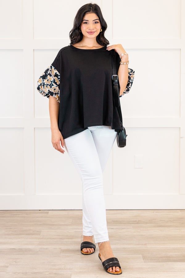 Chic Soul plus size clothing, black top with gold floral pattern on the puff sleeves
