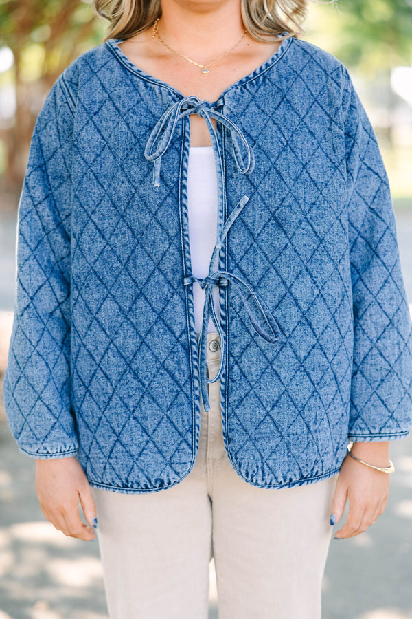 Plus Size quilted denim jacket with a diamond pattern, tie-front closures, and long sleeves.
