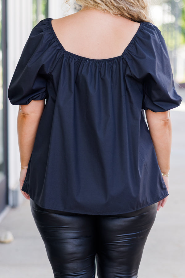 Chic Soul plus size clothing, short-sleeve black top with smocked scoop-neckline and puffed sleeves with two white bows on neckline