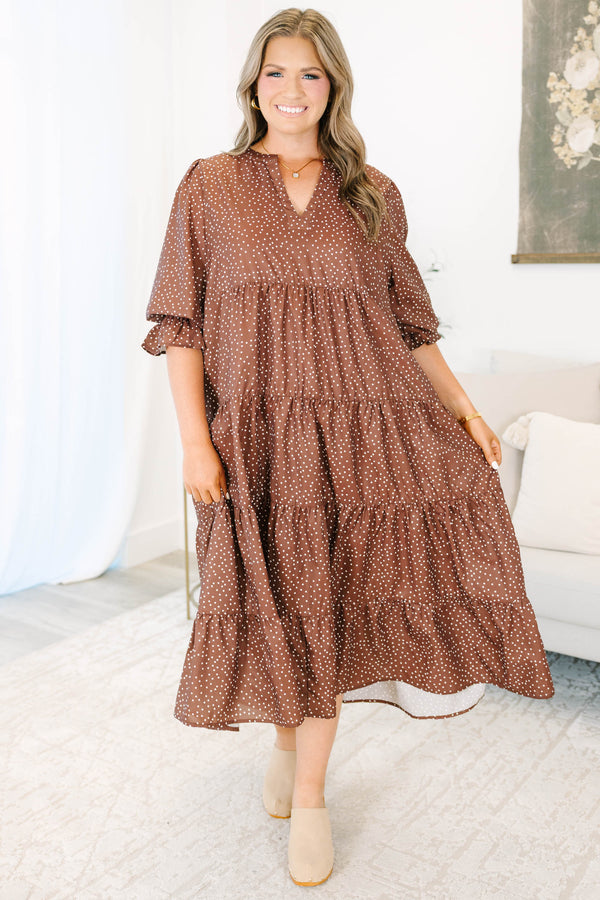 Plus Size brown polka dot tiered midi dress with a V-neckline and short puff sleeves.