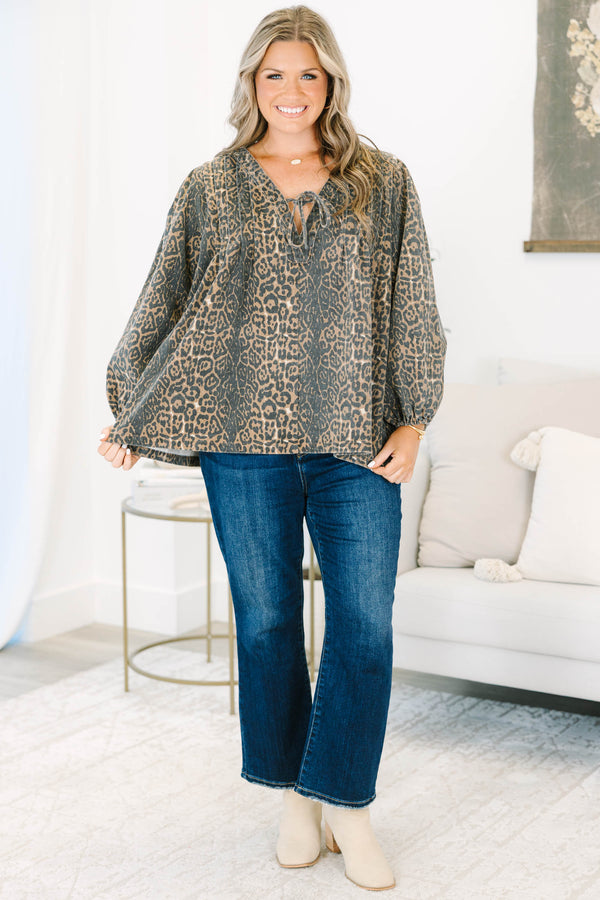 Plus Size leopard print cotton top with a tie-neck, long balloon sleeves, and a relaxed fit.