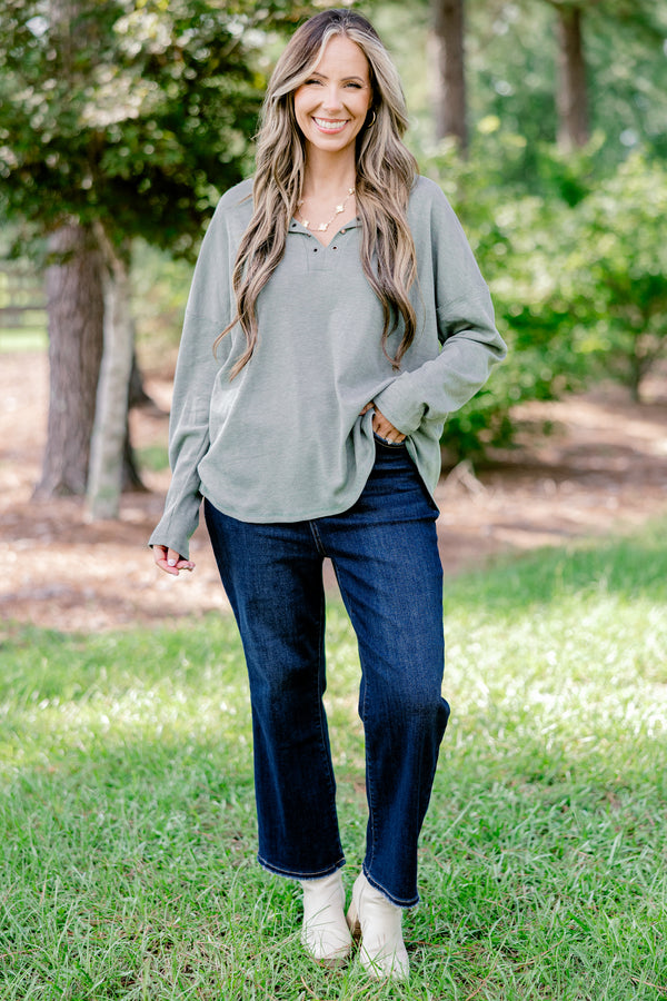 Chic Soul plus size clothing, light olive long sleeve top with scoop hem and buttons 1/4 of the way down the front