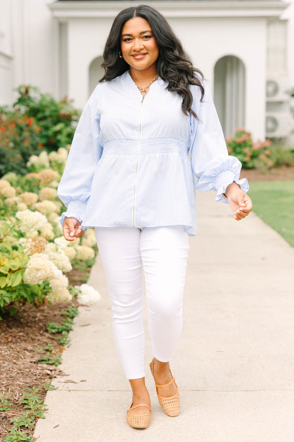 Plus Size light blue and white striped blouse with a zippered front and smocked waist.