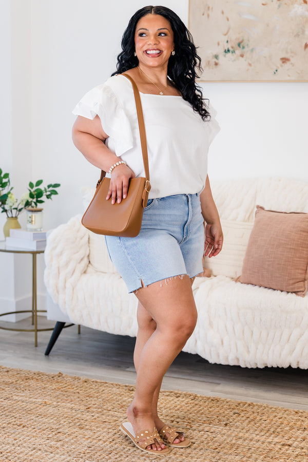Chic Soul plus size clothing, light wash denim shorts with raw edge