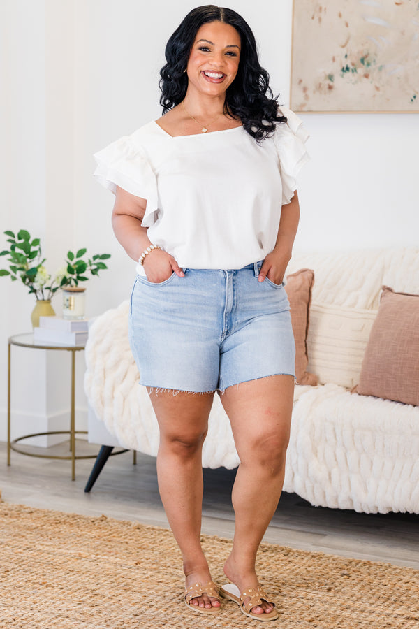 Chic Soul plus size clothing, light wash denim shorts with raw edge