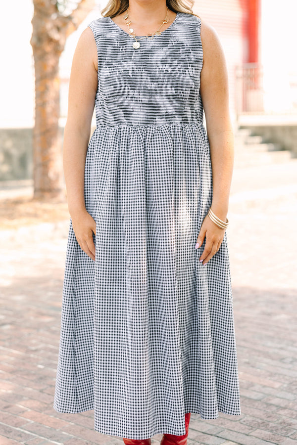 Plus Size black and white gingham midi dress with a sleeveless bodice and a tiered skirt.