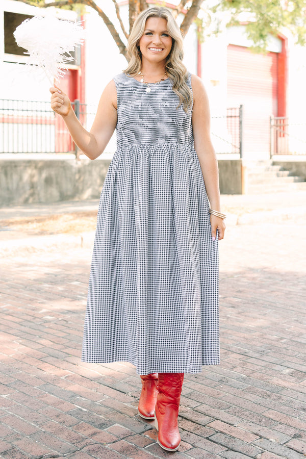 Plus Size black and white gingham midi dress with a sleeveless bodice and a tiered skirt.