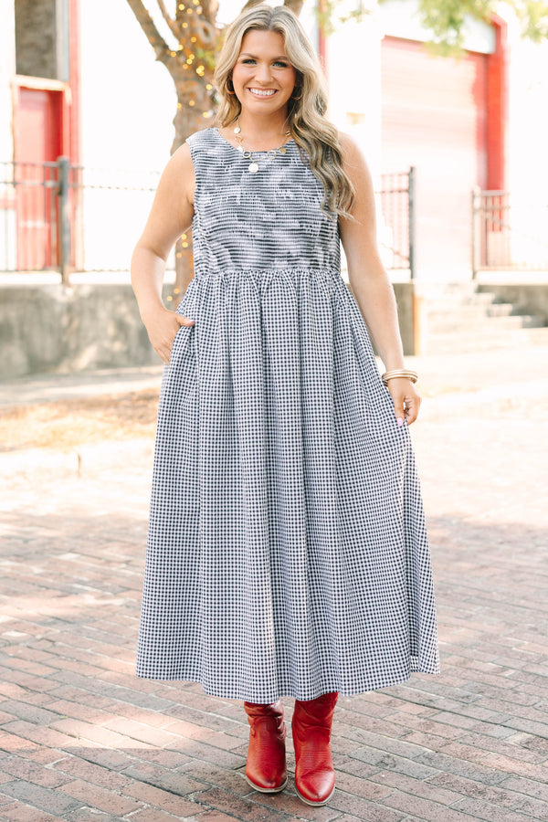 Plus Size black and white gingham midi dress with a sleeveless bodice and a tiered skirt.