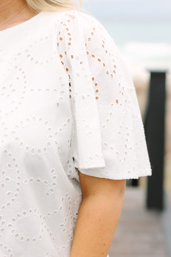 Chic Soul plus size clothing, white top with bell sleeves a slight v-neckline and eyelet material throughout 