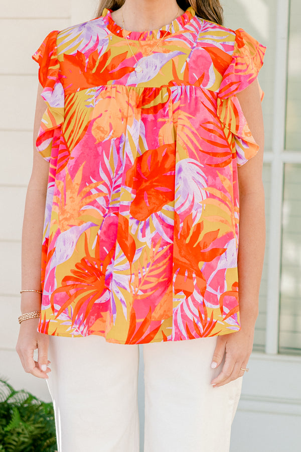 Plus Size tropical floral print top with flutter sleeves and a ruffled neckline.