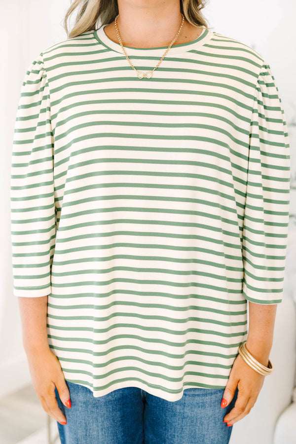 Plus Size olive and white striped crew neck top with puff sleeves and a relaxed fit.