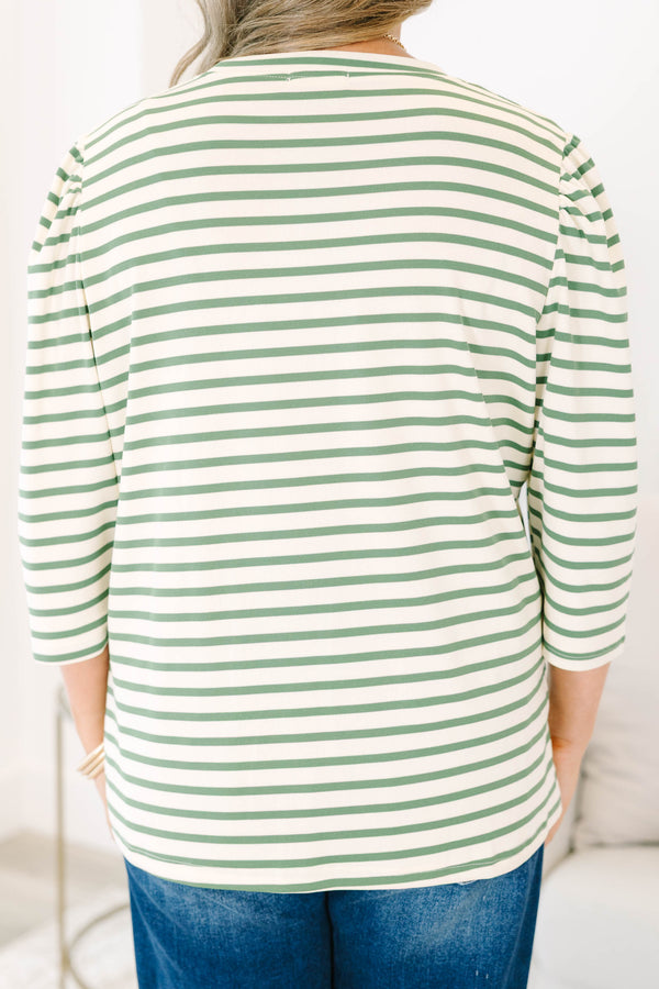 Plus Size olive and white striped crew neck top with puff sleeves and a relaxed fit.