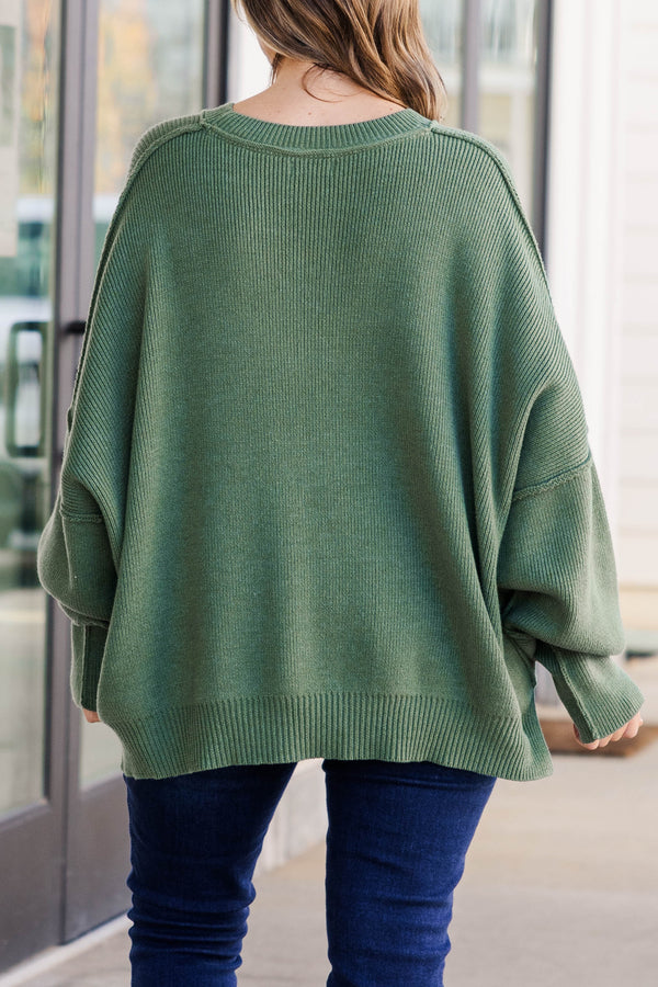 Chic Soul plus size clothing, olive colored sweater regular length, longer on the sides chunky sweater with outward seamlines