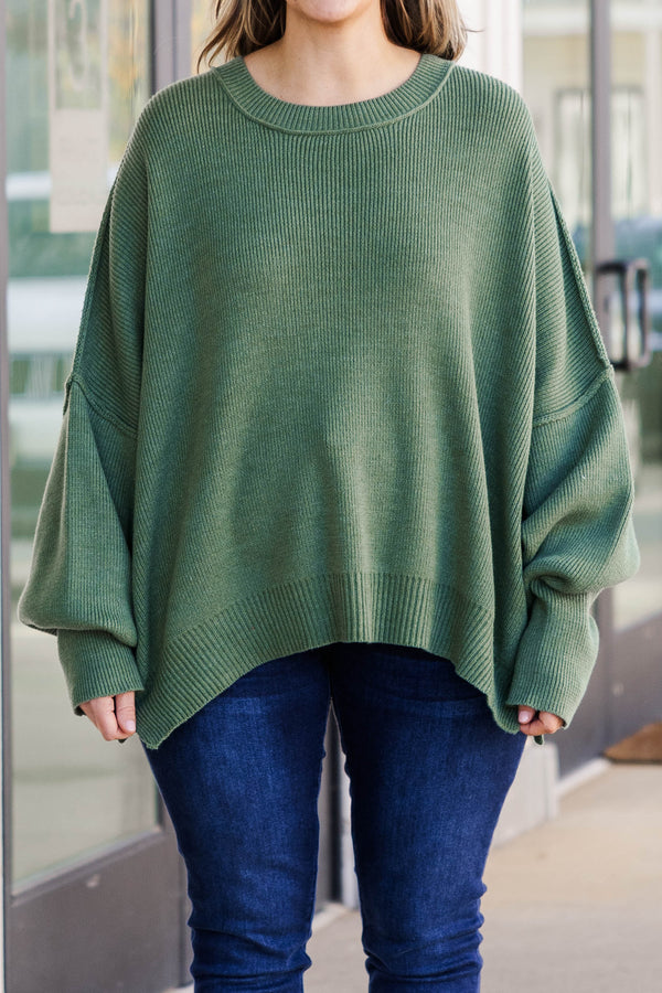Chic Soul plus size clothing, olive colored sweater regular length, longer on the sides chunky sweater with outward seamlines