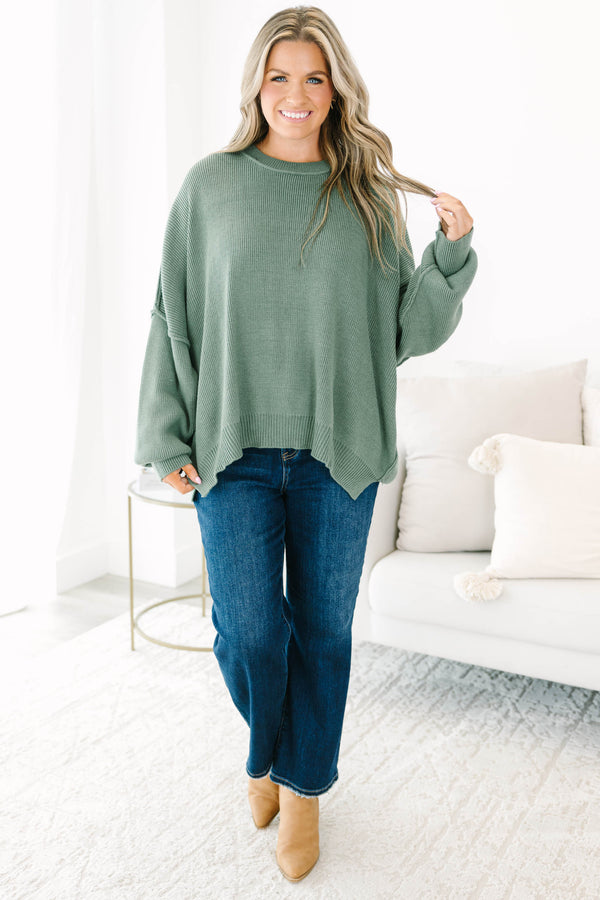 Chic Soul plus size clothing, olive colored sweater regular length, longer on the sides chunky sweater with outward seamlines