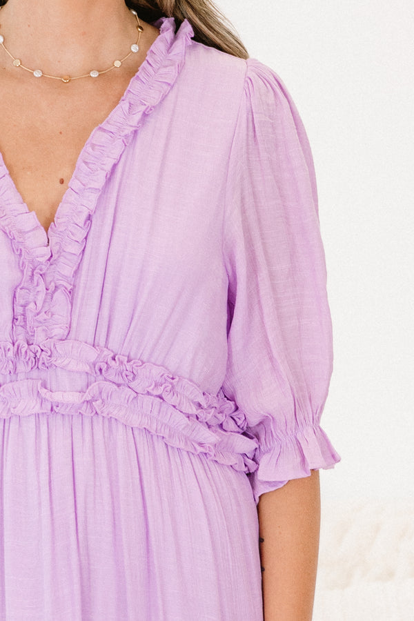 Chic Soul plus size clothing, lilac tiered midi dress with  short sleeves and ruffle details on each tier and the v-neckline 