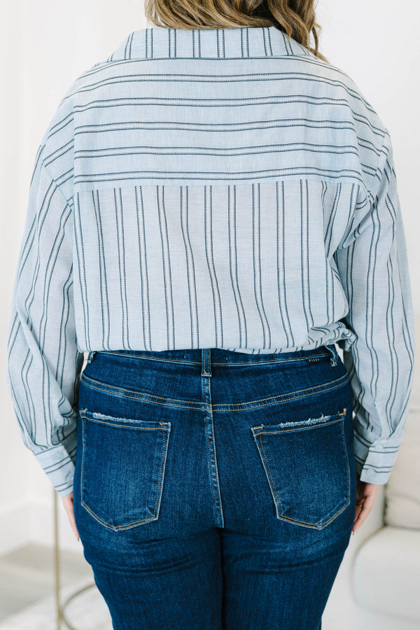Plus Size blue and white vertical striped 100% cotton top with long sleeves and a tie-front hem.