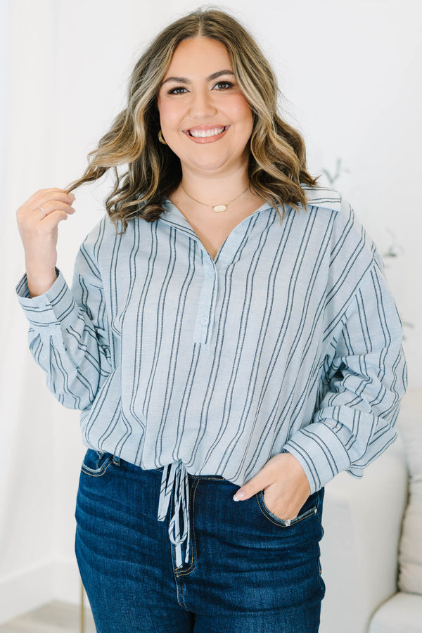 Plus Size blue and white vertical striped 100% cotton top with long sleeves and a tie-front hem.