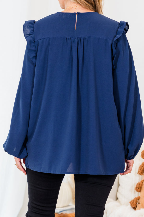 Chic Soul plus size clothing, navy long sleeve flowy long sleeve top with round neckline and bubble cuff sleeves with ruffle detail on shoulders