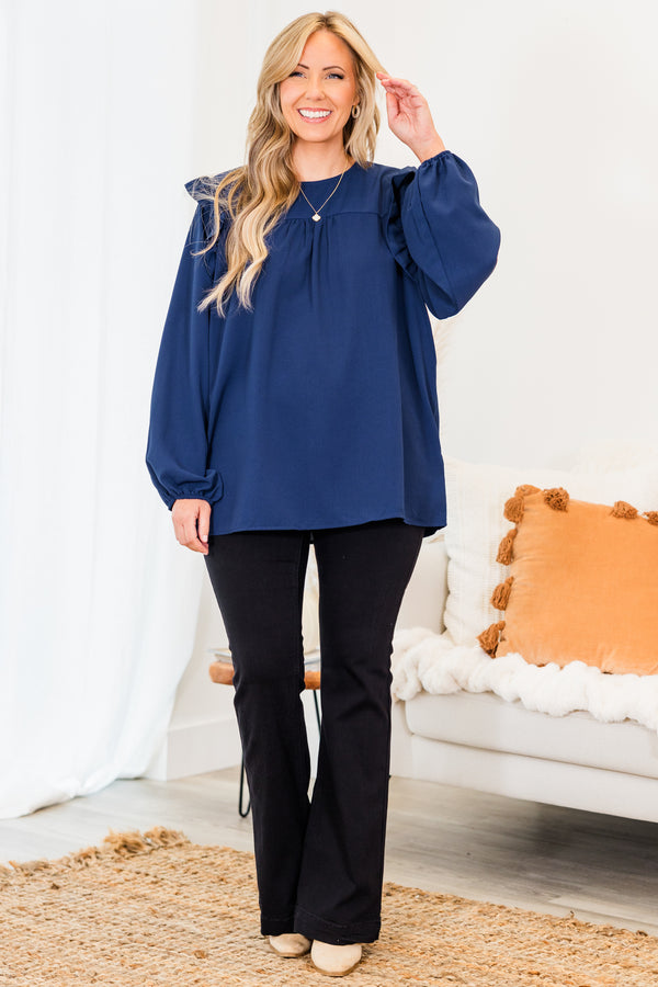 Chic Soul plus size clothing, navy long sleeve flowy long sleeve top with round neckline and bubble cuff sleeves with ruffle detail on shoulders