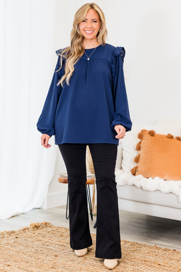 Chic Soul plus size clothing, navy long sleeve flowy long sleeve top with round neckline and bubble cuff sleeves with ruffle detail on shoulders