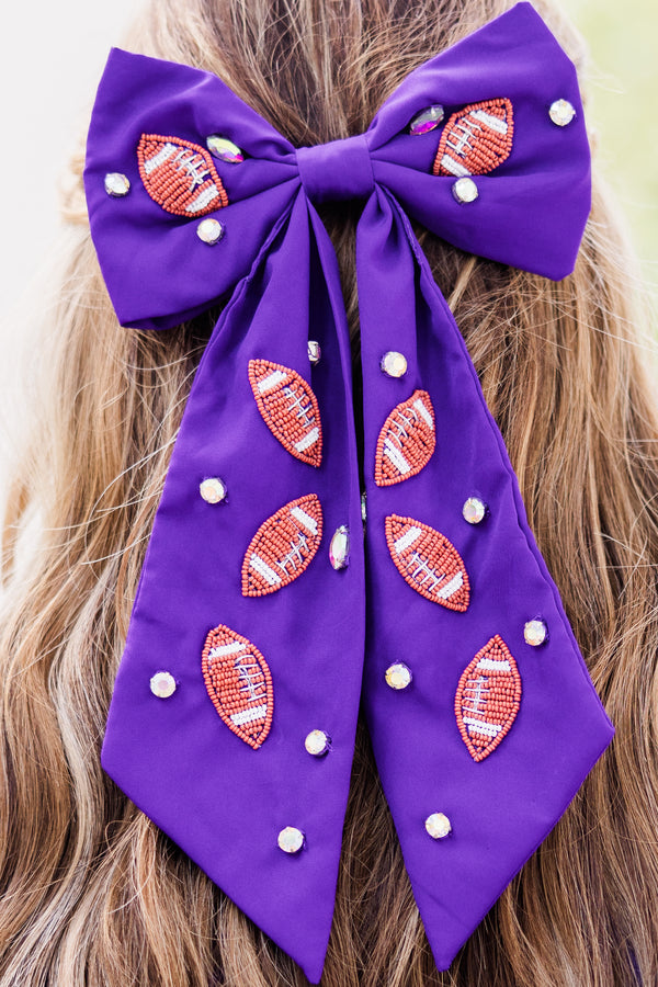 Chic Soul plus size clothing, purple hair bow with football patches and gemstones scattered across bow