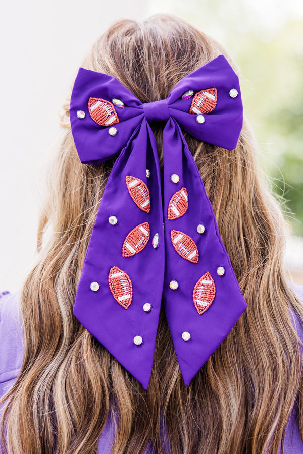 Chic Soul plus size clothing, purple hair bow with football patches and gemstones scattered across bow