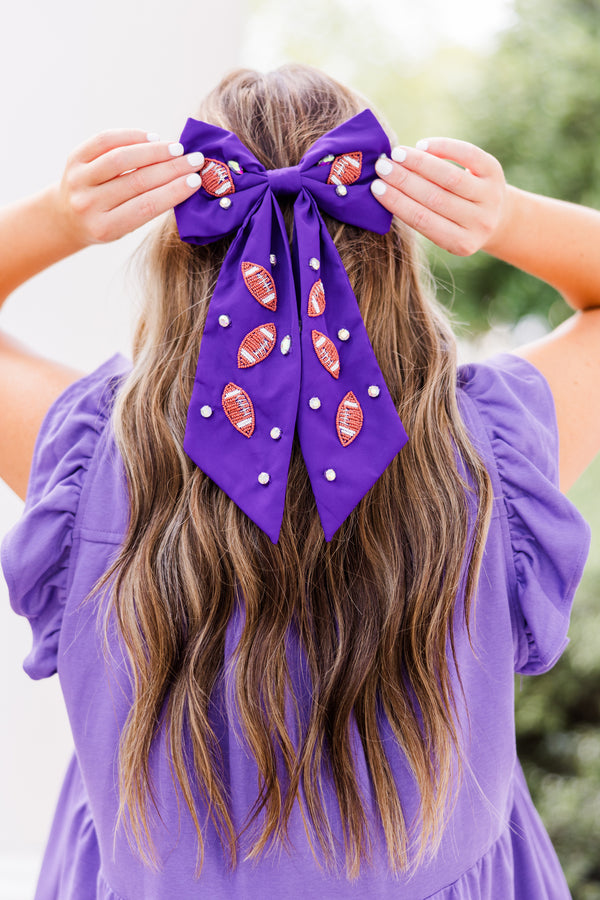 Chic Soul plus size clothing, purple hair bow with football patches and gemstones scattered across bow