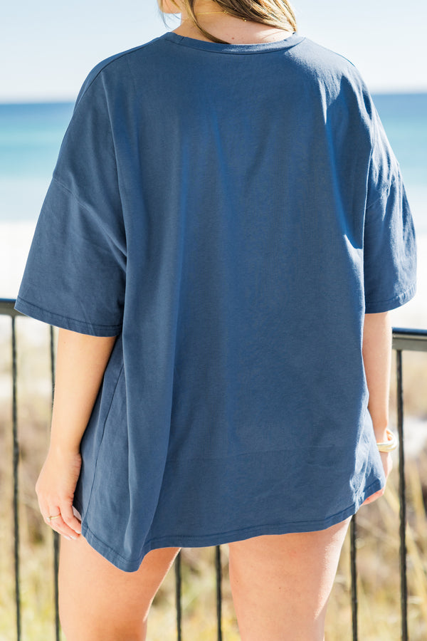  Chic Soul plus size clothing, short-sleeve navy blue boyfriend tee with a high-scoop-neckline and graphic art of a pink palm tree with green arched lettering stating 