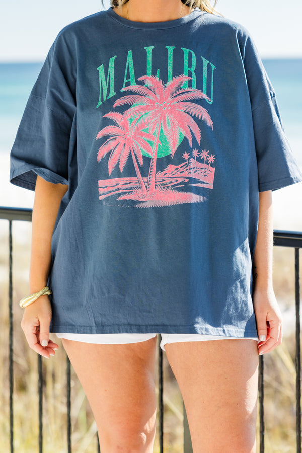  Chic Soul plus size clothing, short-sleeve navy blue boyfriend tee with a high-scoop-neckline and graphic art of a pink palm tree with green arched lettering stating 